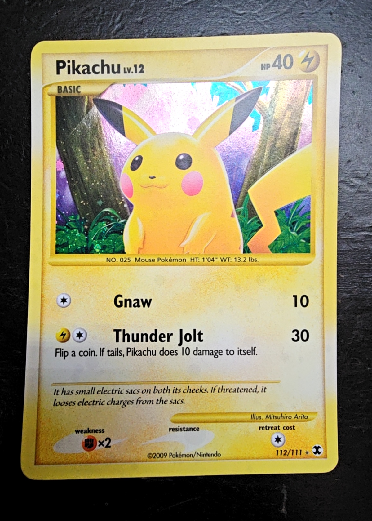 Pikachu LV.12 - Grade 7 - Rising Rivals #112/111 | TCGrader