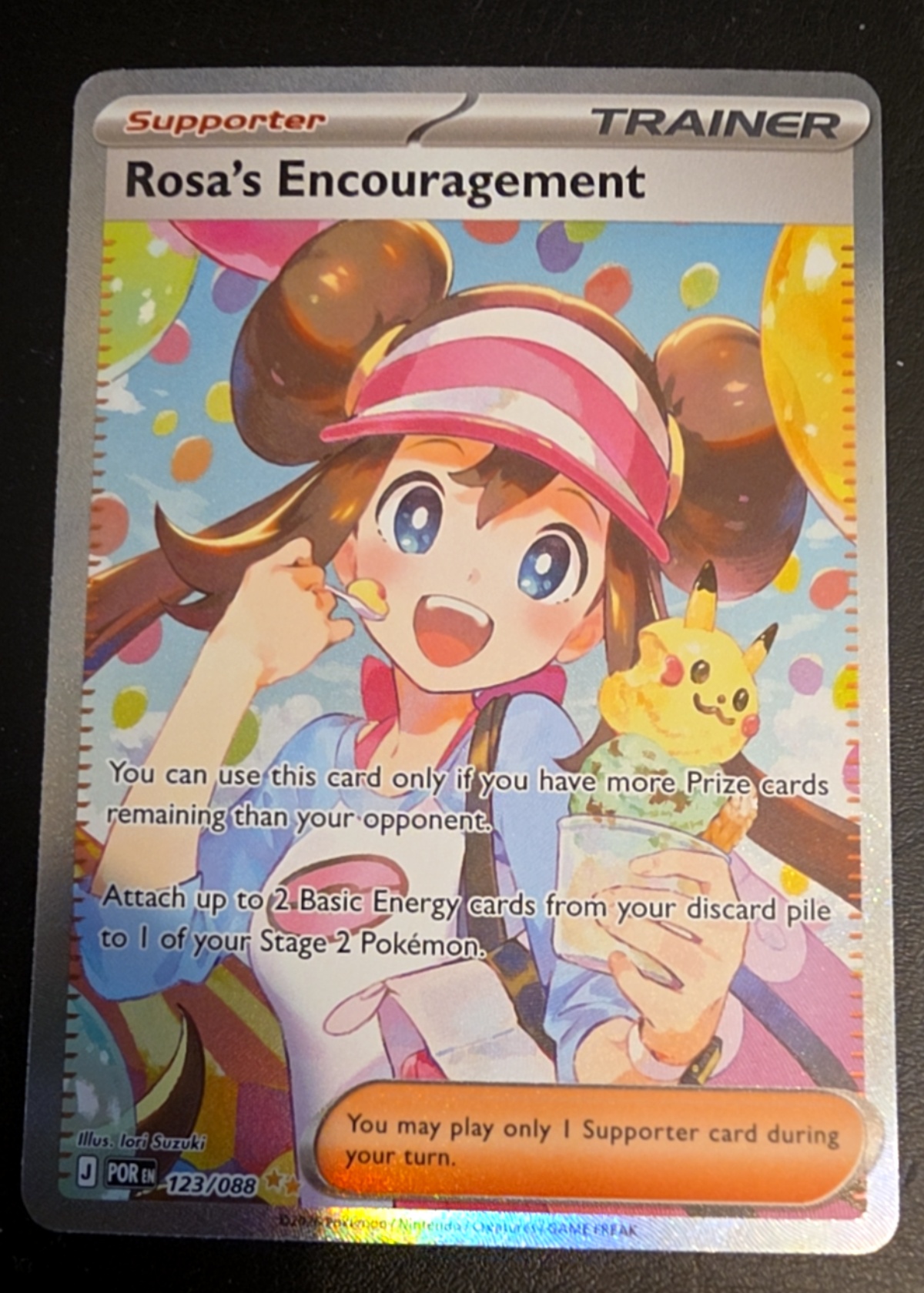 Rosa's Encouragement - Grade 9 - Prismatic Evolutions #123/088